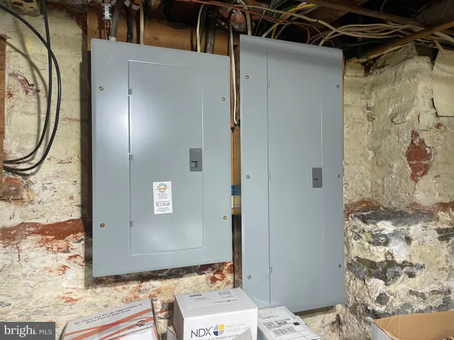 a front view of a building with a yard