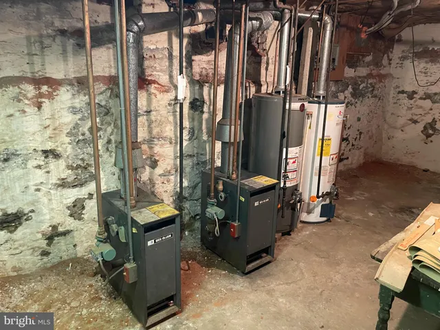 a view of a front door and small yard