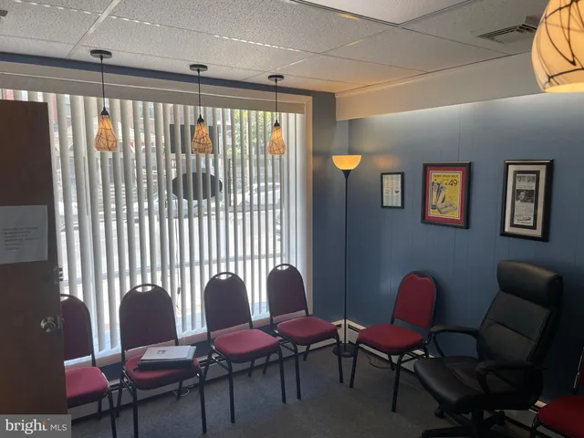 a view of balcony with wooden floor and fence