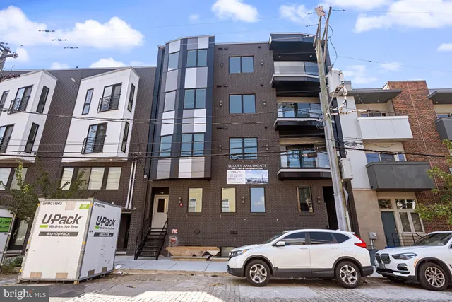 a car parked in front of a building