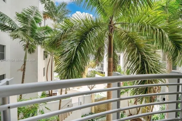 a view of a balcony with a plant