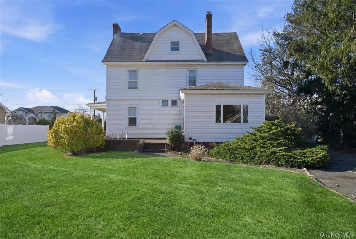 590 Waterview Road Oceanside, NY 11572 - Photo 24 of 26 a view of front of house with a yard