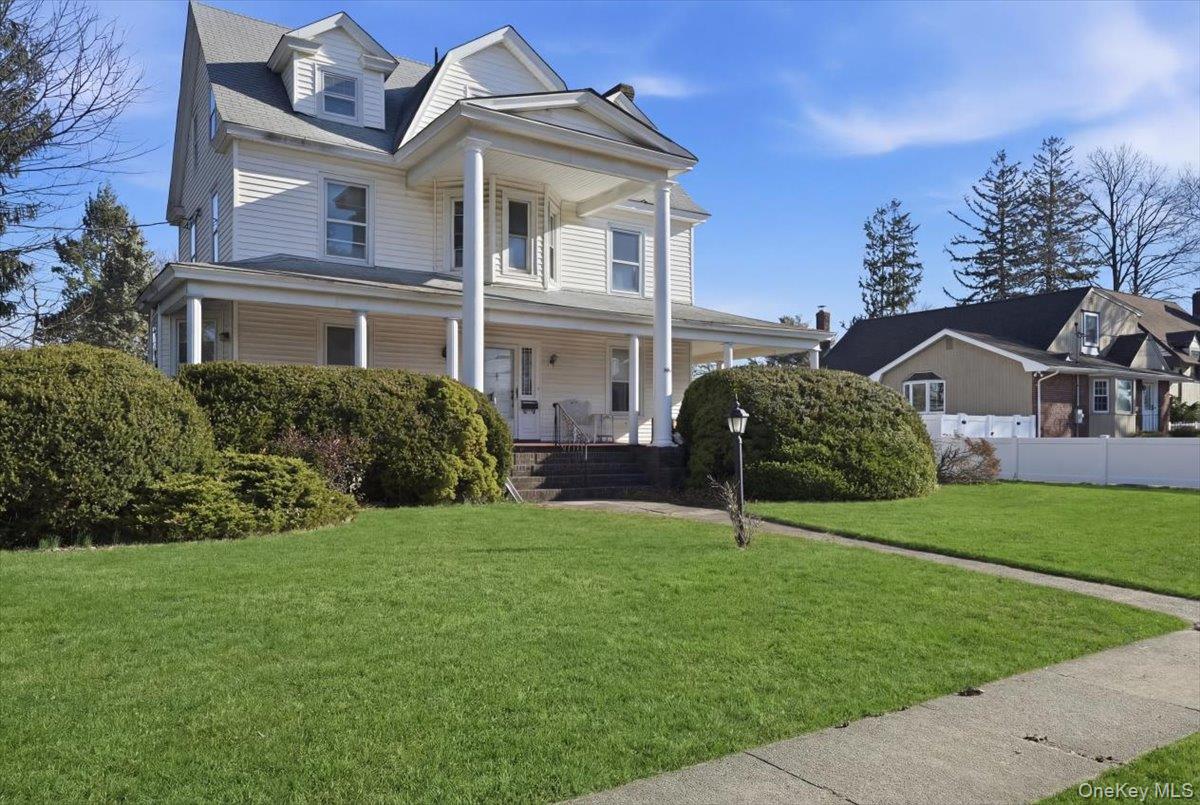 590 Waterview Road Oceanside, NY 11572 - Photo 26 of 26 front view of a house with a yard