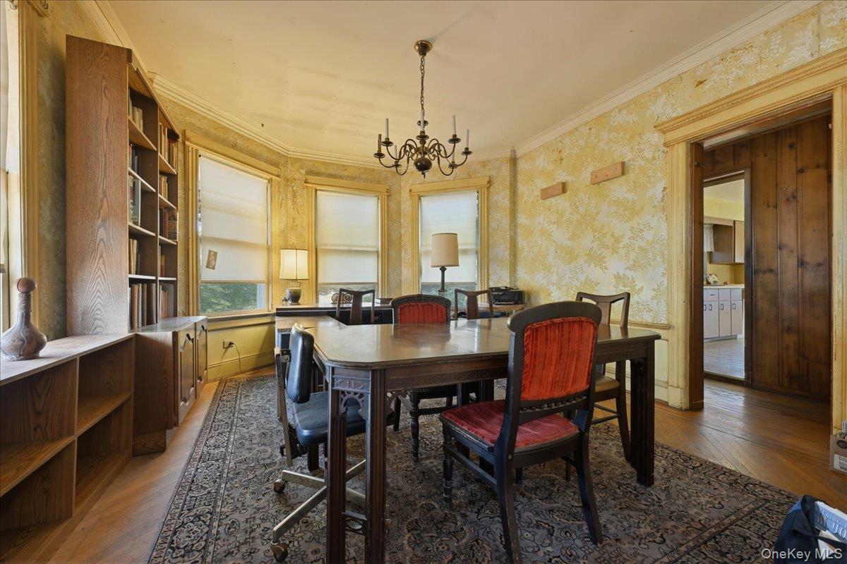 590 Waterview Road Oceanside, NY 11572 - Photo 5 of 26 a view of a a dining room with furniture window and wooden floor