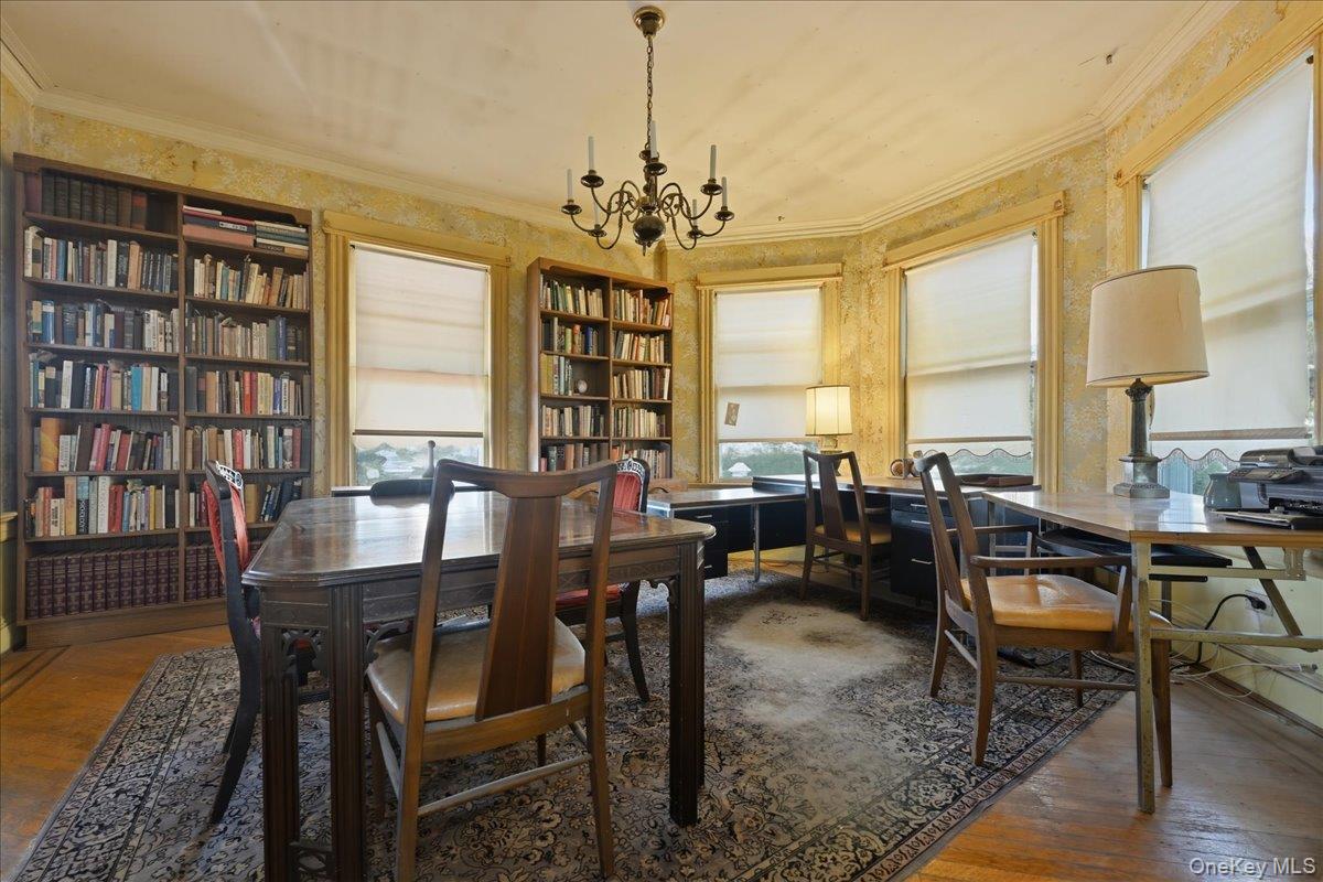 590 Waterview Road Oceanside, NY 11572 - Photo 6 of 26 a view of a dining room with furniture window and wooden floor