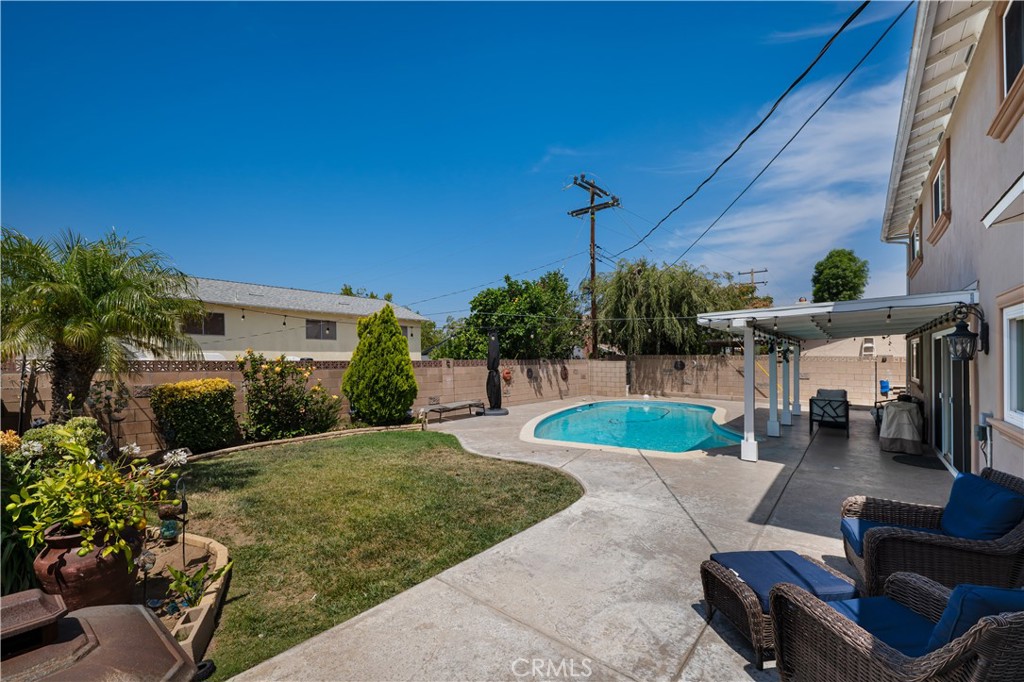 2203 Homewood Avenue Simi Valley, CA 93063 - Photo 33 of 37 a front view of a house with garden