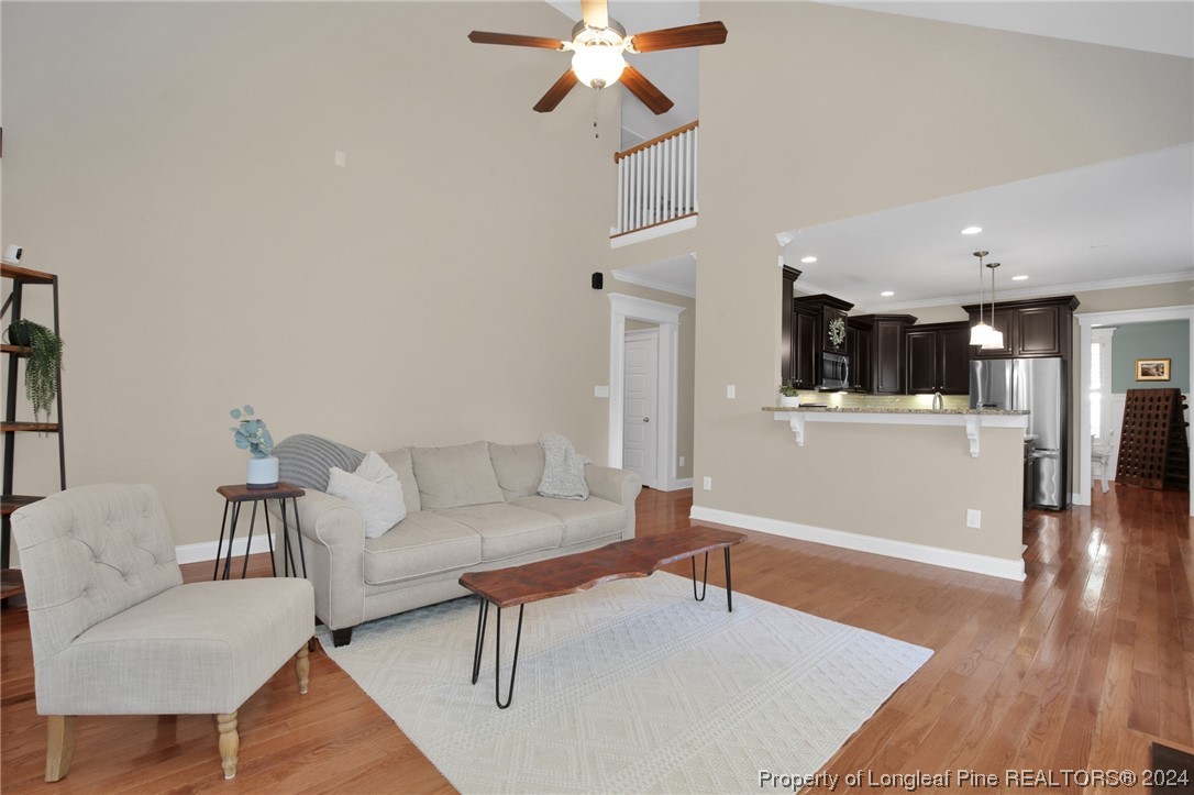 43 Shellnut Circle Spring Lake, NC 28390 - Photo 11 of 35 a living room with furniture and a wooden floor