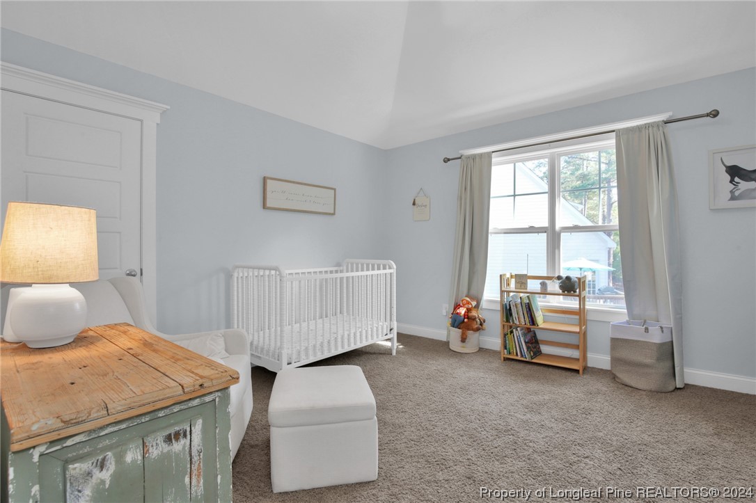 43 Shellnut Circle Spring Lake, NC 28390 - Photo 20 of 35 a bedroom with furniture and a window