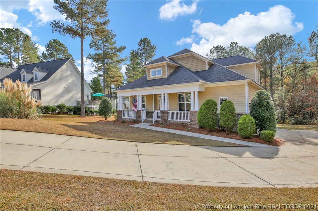 43 Shellnut Circle Spring Lake, NC 28390 - Photo 2 of 35 a view of a house with a yard and plants