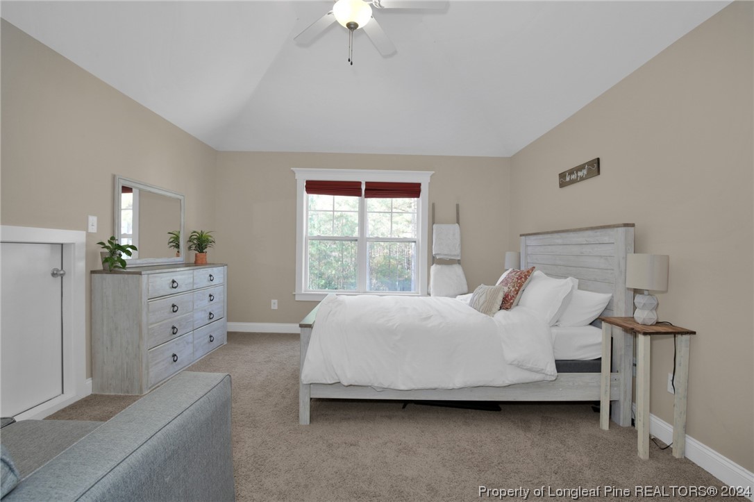 43 Shellnut Circle Spring Lake, NC 28390 - Photo 22 of 35 a spacious bedroom with a bed and a window