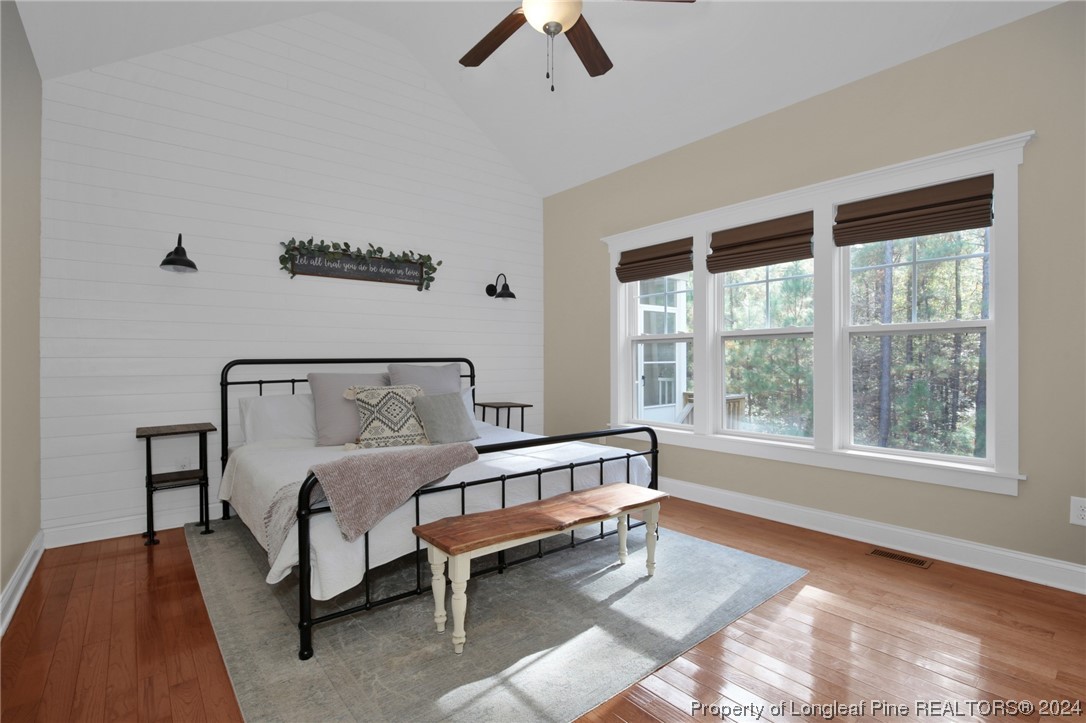 43 Shellnut Circle Spring Lake, NC 28390 - Photo 25 of 35 a bedroom with a bed and a large window