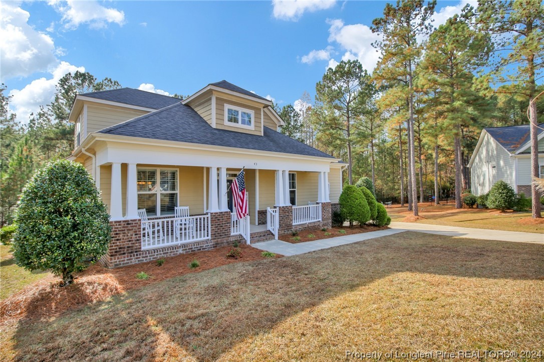 43 Shellnut Circle Spring Lake, NC 28390 - Photo 3 of 35 a view of a house with backyard and sitting area