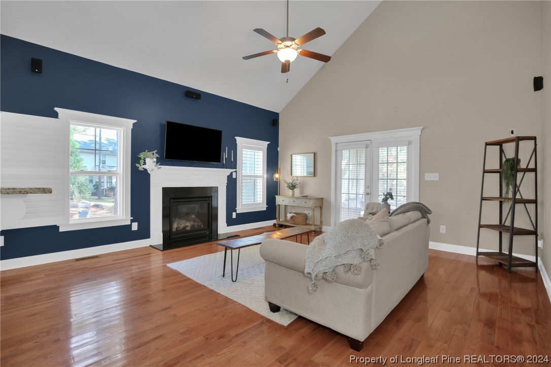 43 Shellnut Circle Spring Lake, NC 28390 - Photo 8 of 35 a living room with furniture fireplace and flat screen tv