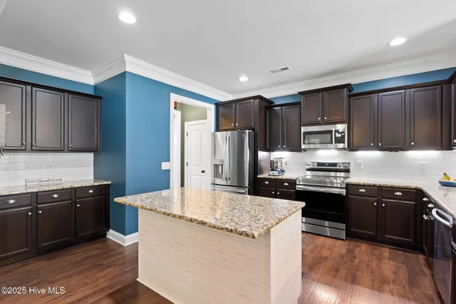 $650,000 | 107 Weir Drive, Hampstead, NC 28443