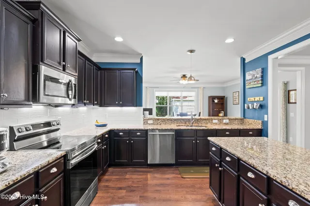 $650,000 | 107 Weir Drive, Hampstead, NC 28443