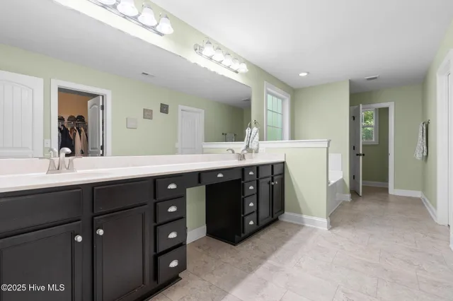 $650,000 | 107 Weir Drive, Hampstead, NC 28443