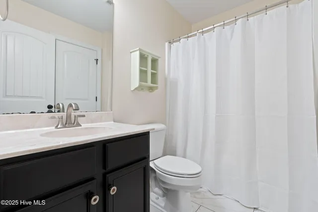 $650,000 | 107 Weir Drive, Hampstead, NC 28443