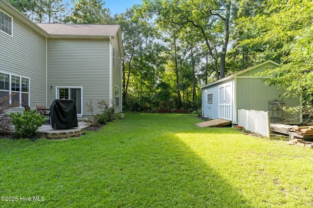 $650,000 | 107 Weir Drive, Hampstead, NC 28443