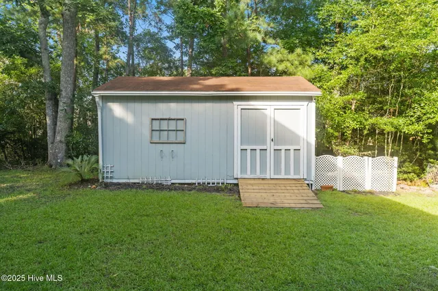 $650,000 | 107 Weir Drive, Hampstead, NC 28443