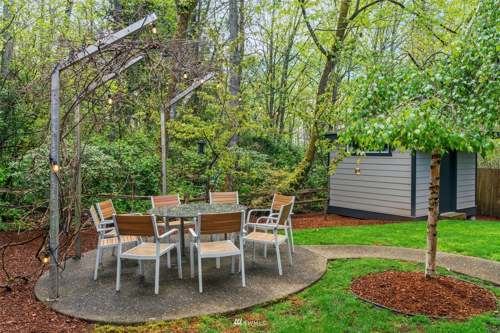 805 South 34th Place Renton, WA 98055 - Photo 27 of 36 a view of a backyard with a patio and entertaining space