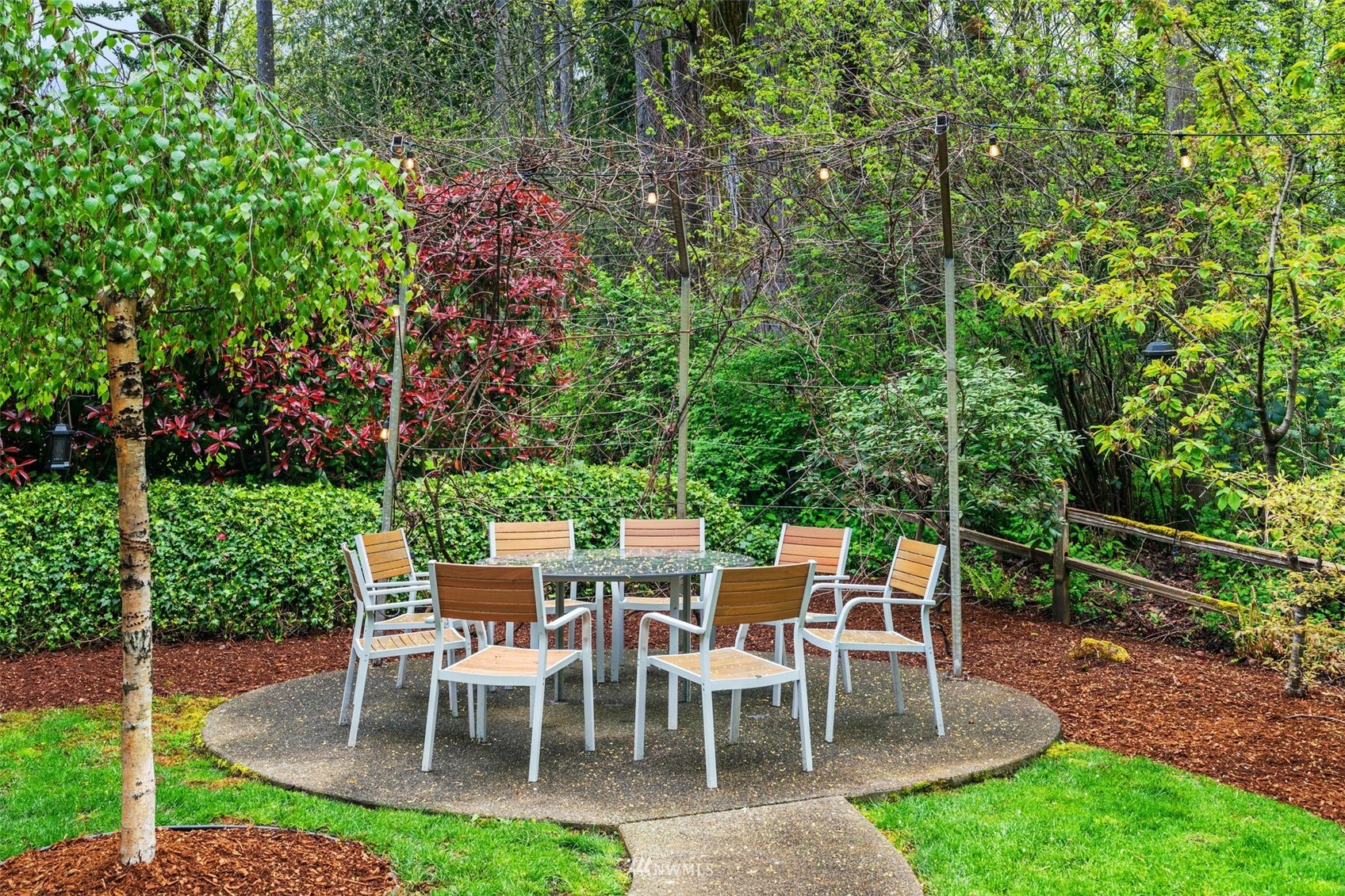 805 South 34th Place Renton, WA 98055 - Photo 30 of 36 a view of a backyard with sitting area