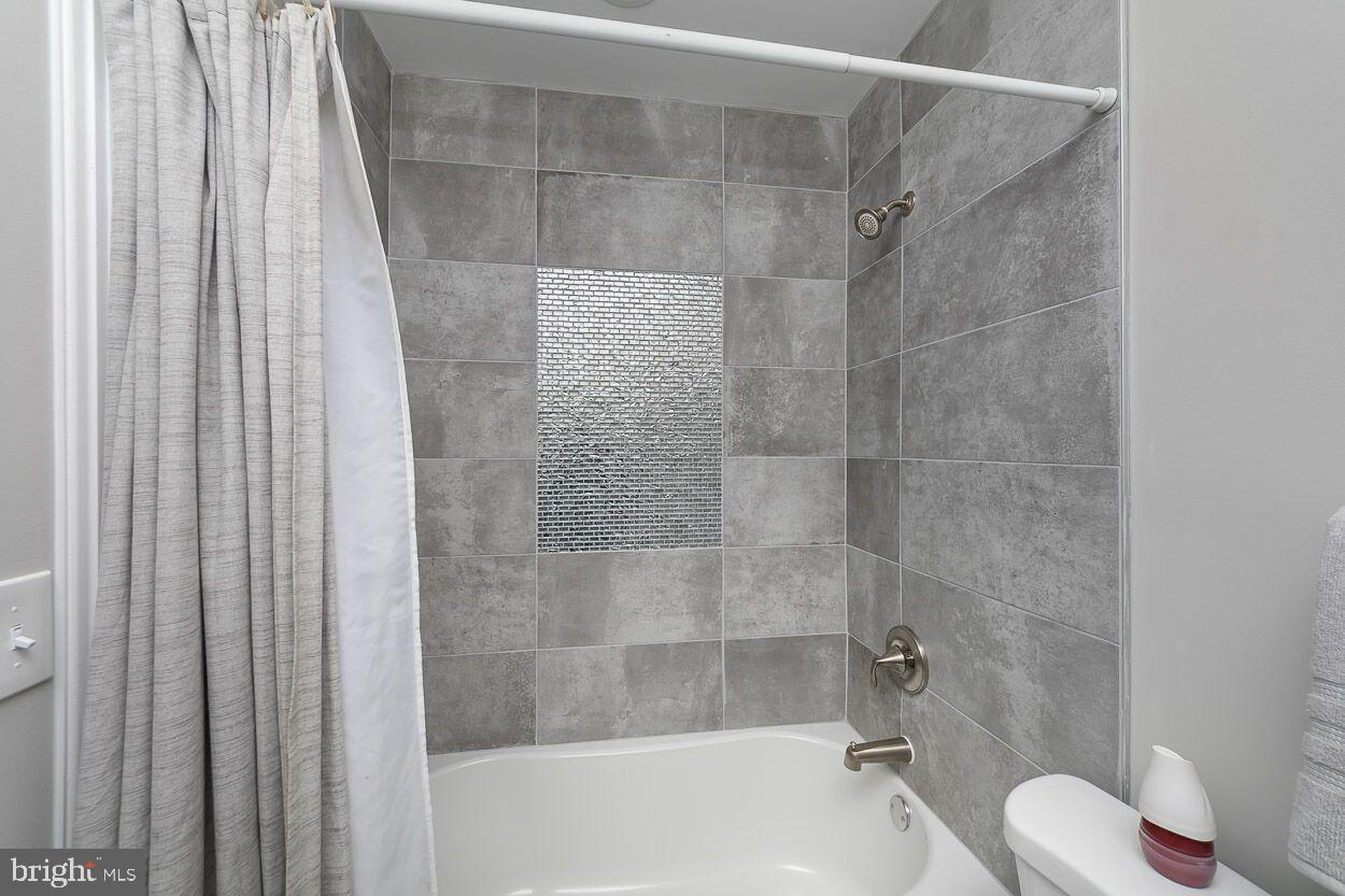 3705 Ellamont Road Baltimore, MD 21215 - Photo 14 of 49 TOTALLY RENOVATED HALLWAY BATH WITH TUB