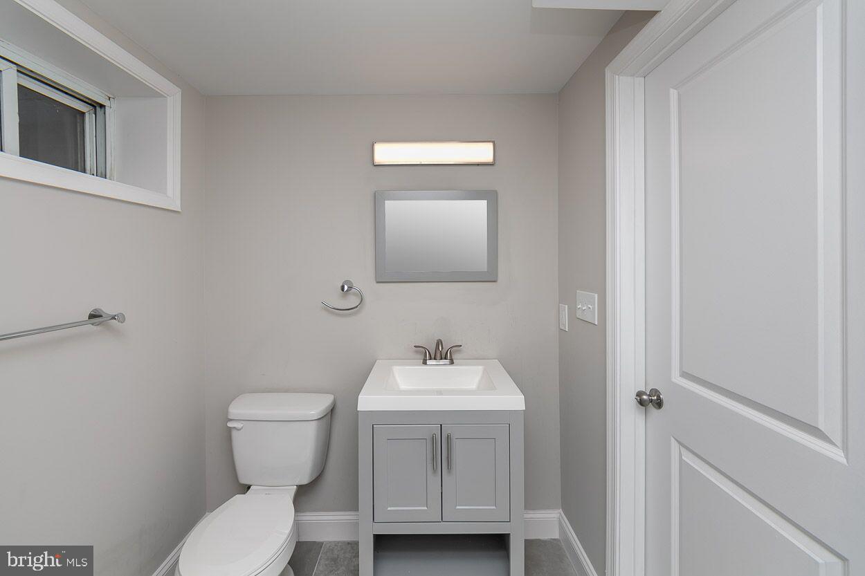 3705 Ellamont Road Baltimore, MD 21215 - Photo 17 of 49 BASEMENT TOTALLY RENOVATED FULL BATH