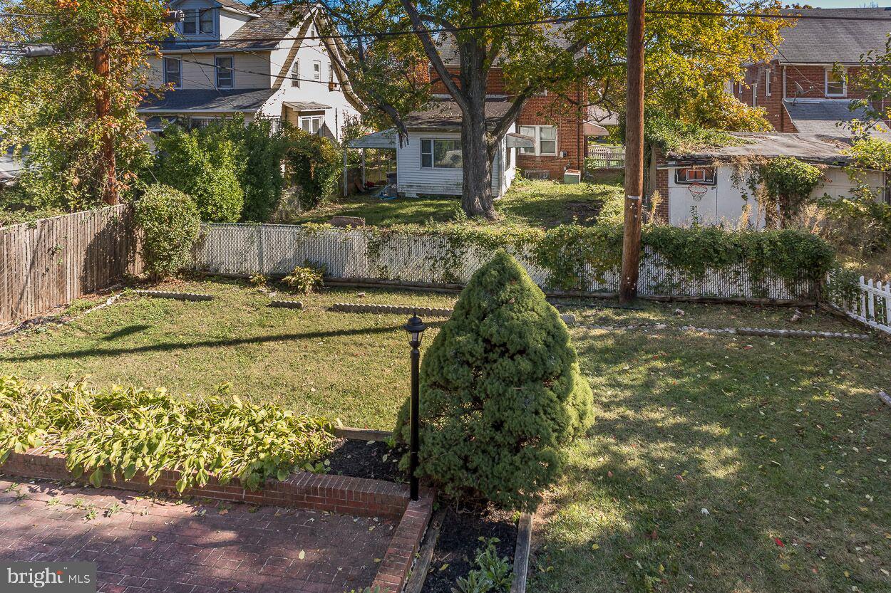 3705 Ellamont Road Baltimore, MD 21215 - Photo 45 of 49 SPACIOUS REAR YARD WITH PATIO AND PORCH!