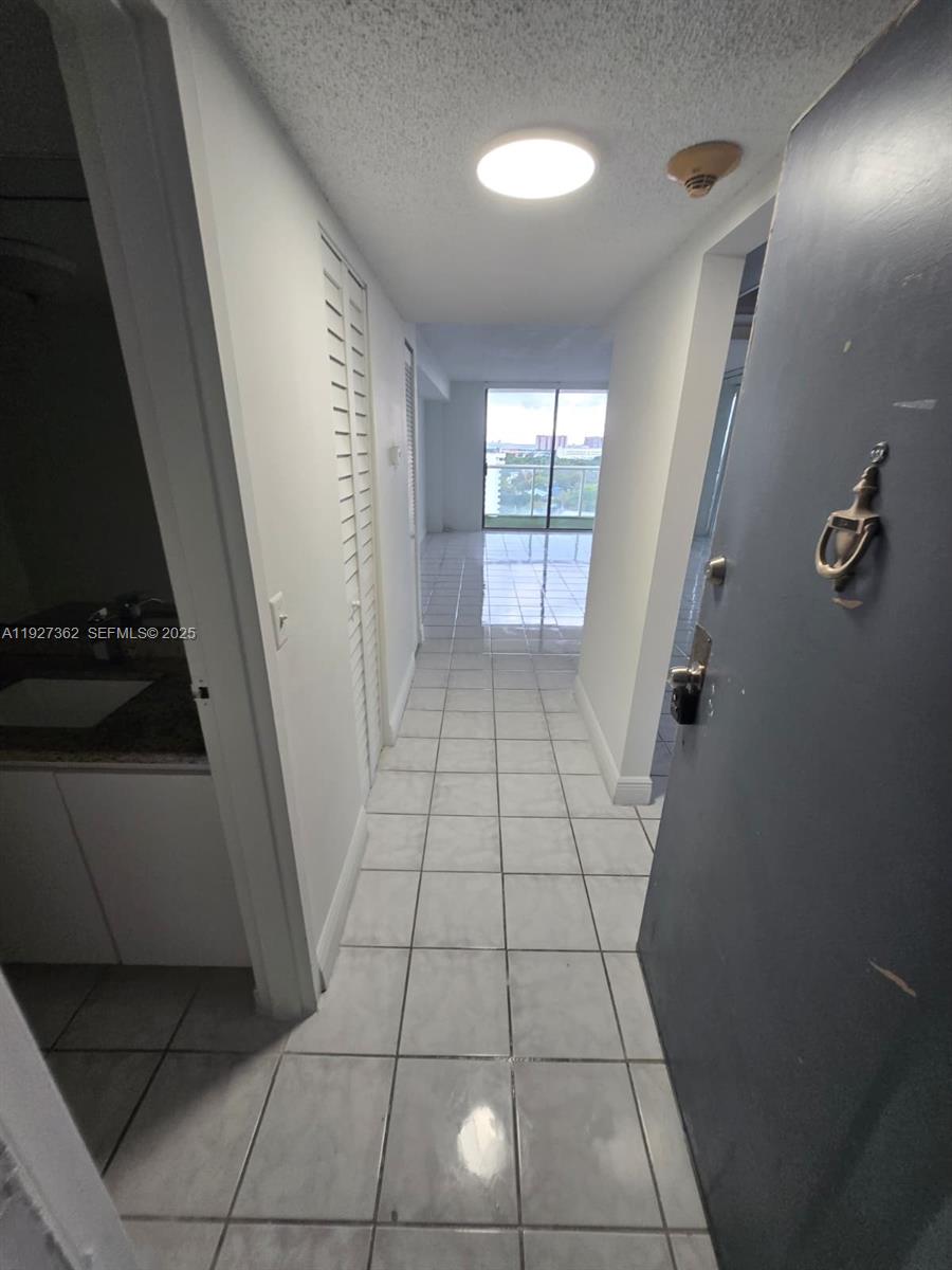 13499 Biscayne Boulevard, Unit 1204 North Miami, FL 33181 - Photo 11 of 13 a view of empty room with window