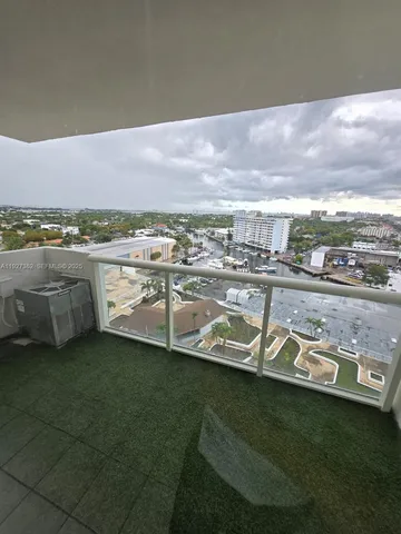 a view of a swimming pool with an ocean view
