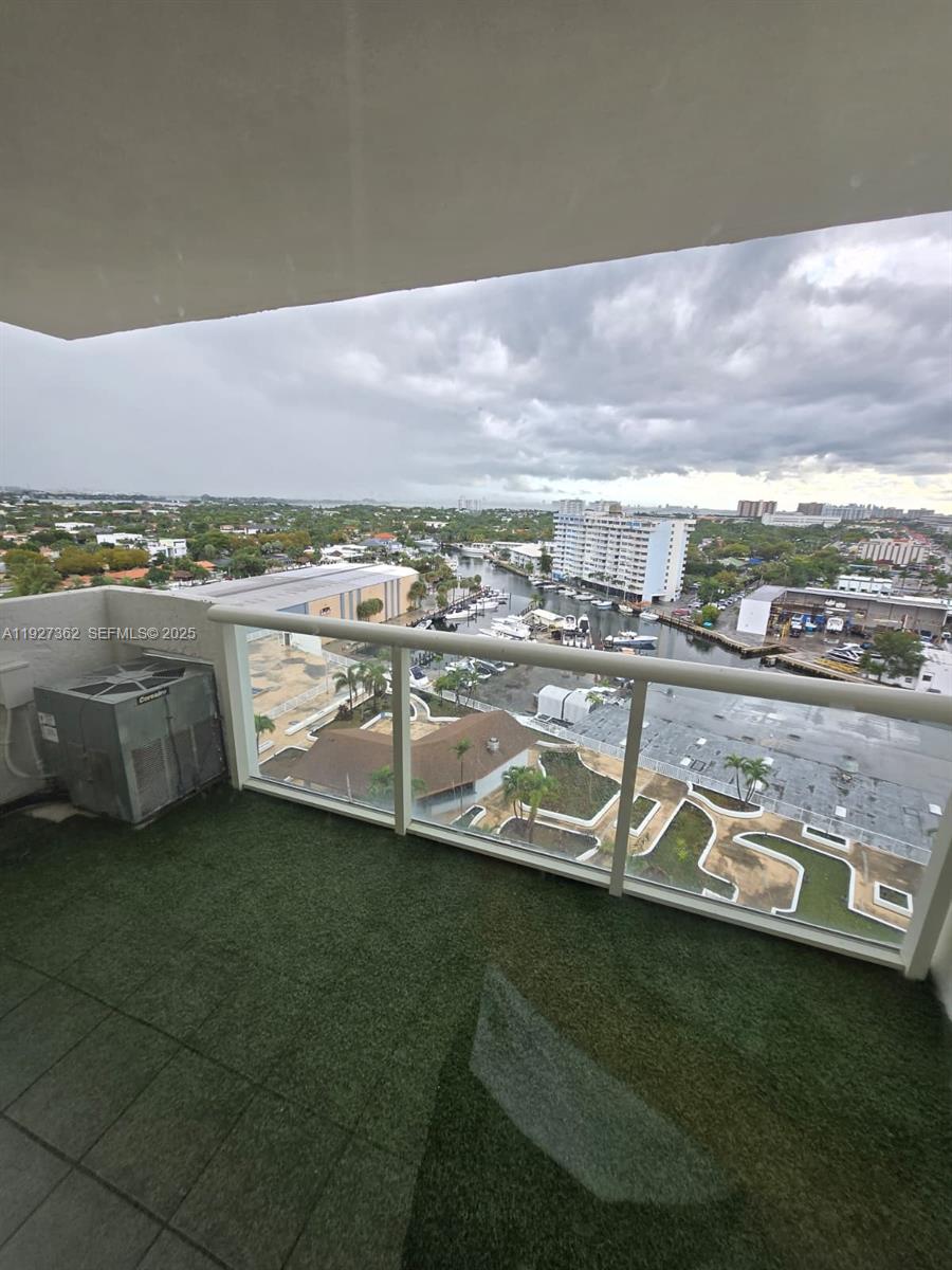 13499 Biscayne Boulevard, Unit 1204 North Miami, FL 33181 - Photo 12 of 13 a view of a swimming pool with an ocean view