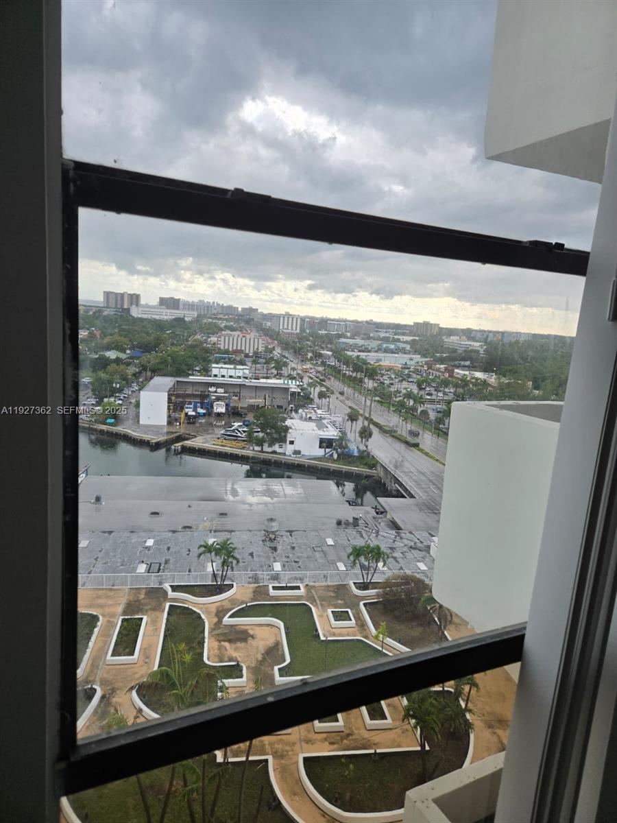 13499 Biscayne Boulevard, Unit 1204 North Miami, FL 33181 - Photo 8 of 13 a view of a balcony with an outdoor space