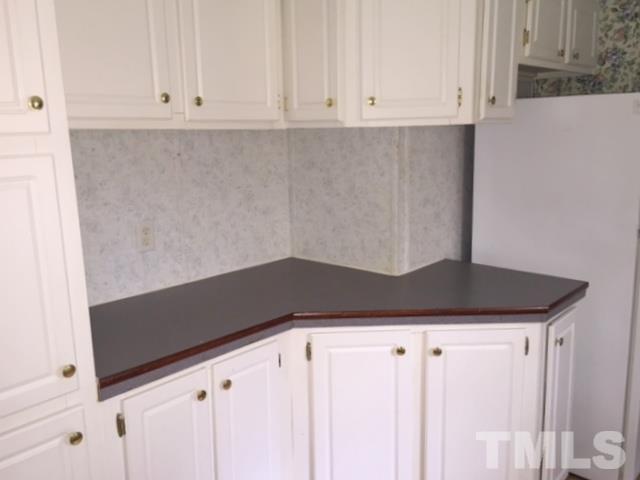 216 New Creech Road Selma, NC 27576 - Photo 5 of 14 a close view of cabinet