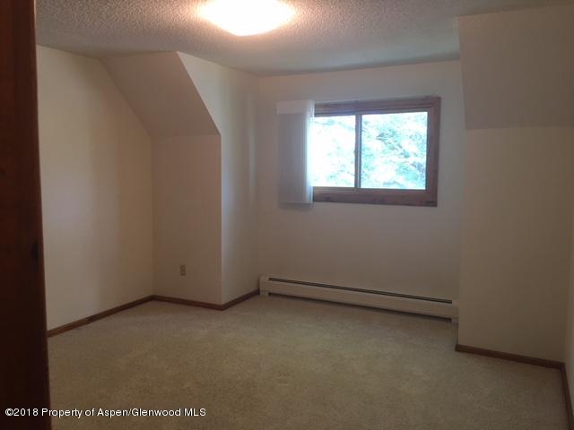 570 Will Avenue Rifle, CO 81650 - Photo 7 of 13 an empty room with a window