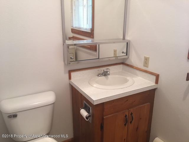 570 Will Avenue Rifle, CO 81650 - Photo 8 of 13 a bathroom with a sink and a toilet