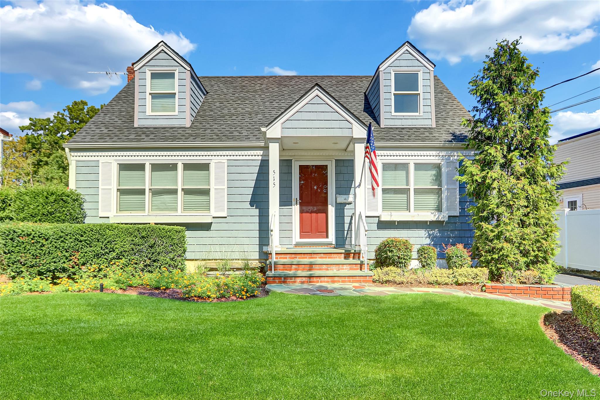 515 Chelsea Road Oceanside, NY 11572 - Photo 1 of 1 Cape cod home featuring a shingled roof