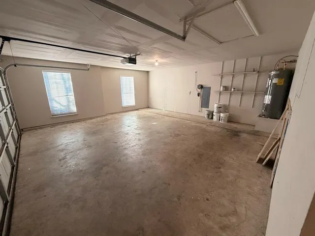 a view of empty room with windows