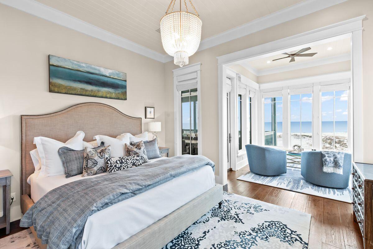 243 West Bermuda Drive Santa Rosa Beach, FL 32459 - Photo 14 of 37 a bedroom with bed and wooden floor