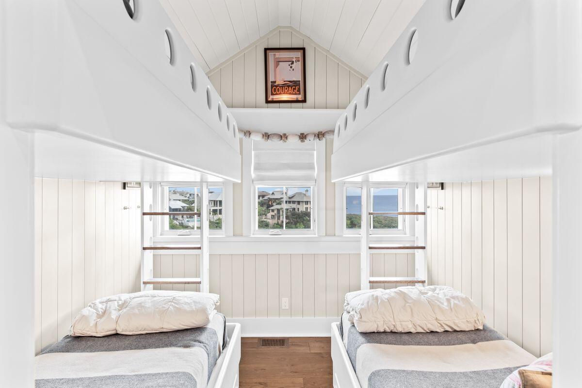 243 West Bermuda Drive Santa Rosa Beach, FL 32459 - Photo 28 of 37 a bedroom with a bed furniture and decor