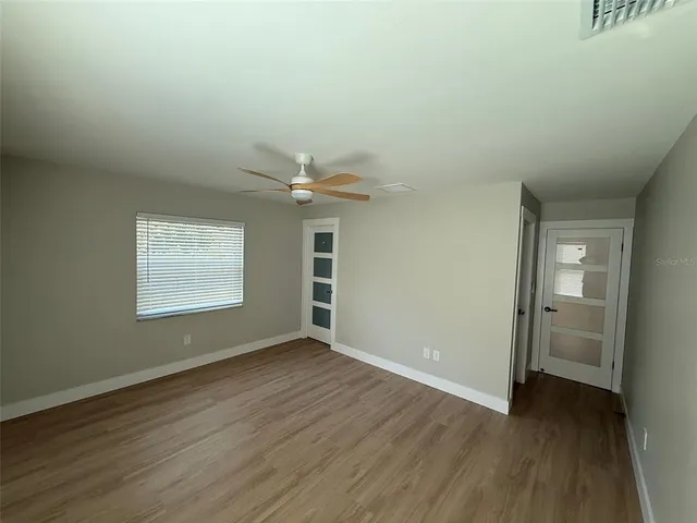 a bathroom with a vanity and a mirror