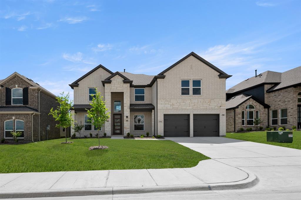 3714 Milwaukee Avenue Midlothian, TX 76065 - Photo 1 of 40 a front view of a house with a yard and garage