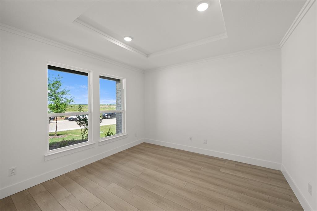 3714 Milwaukee Avenue Midlothian, TX 76065 - Photo 15 of 40 wooden floor in an empty room with a window