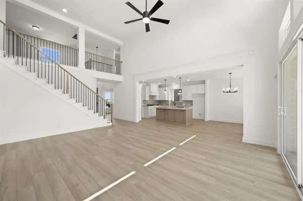 a kitchen with a sink cabinets and window