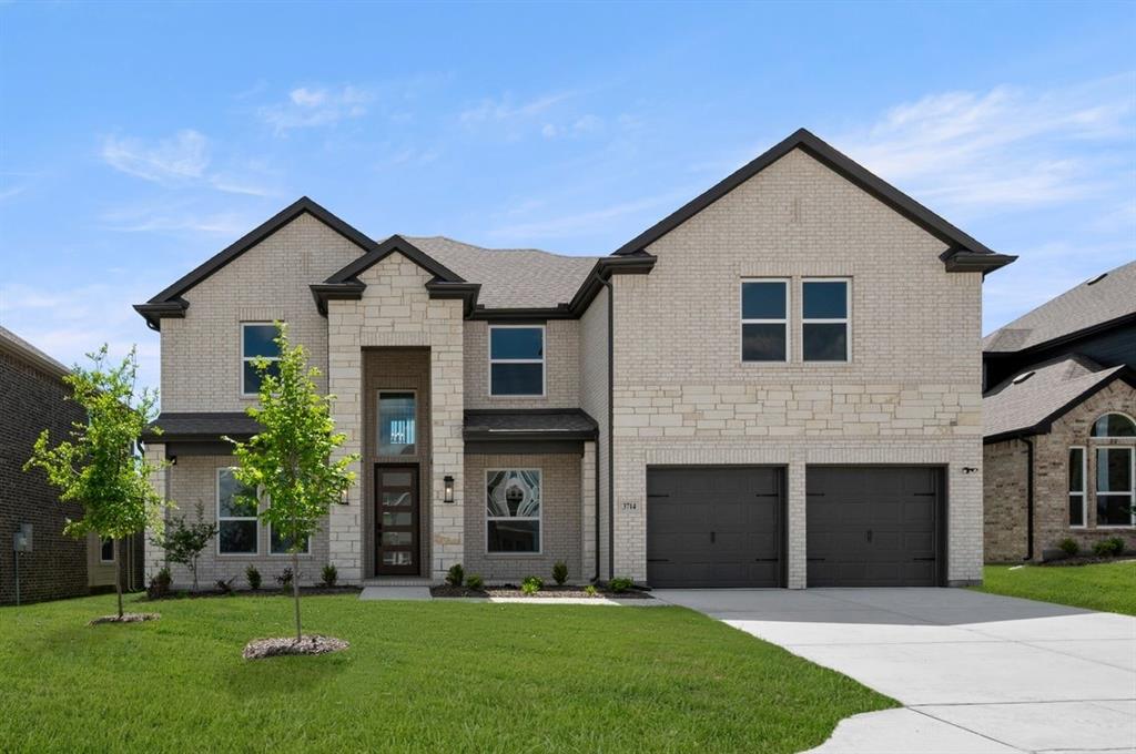 3714 Milwaukee Avenue Midlothian, TX 76065 - Photo 2 of 40 a front view of a house with a yard and trees