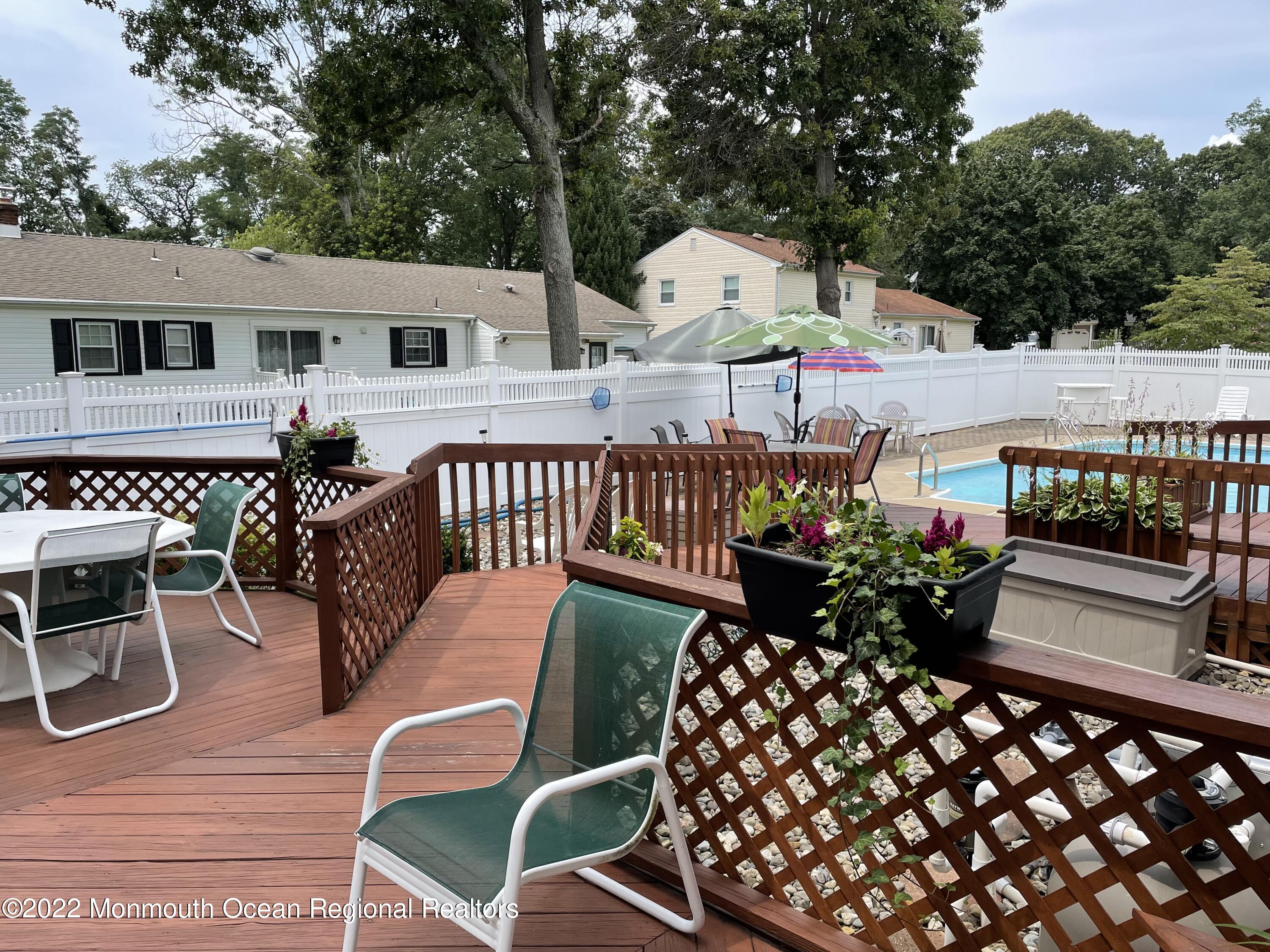 104 Pear Street, Unit WINTER Oakhurst, NJ 07755 - Photo 16 of 17 a outdoor space with patio