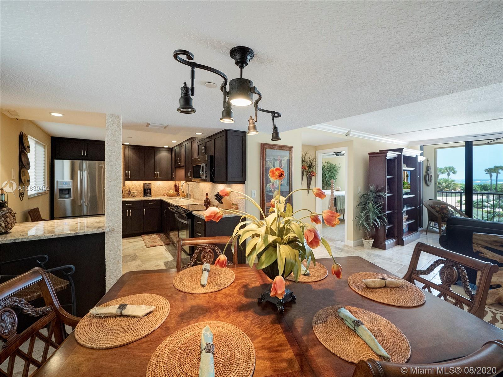 200 Ocean Trail Way, Unit 108 Jupiter, FL 33477 - Photo 6 of 15 DINING ROOM-KITCHEN-LIVING ROOM