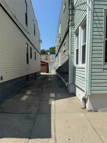 a view of a house with a street