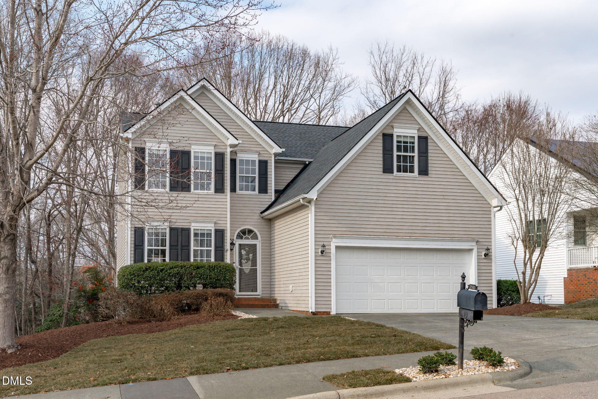 2501 Springfield Park Drive Raleigh, NC 27614 - Photo 1 of 44 a front view of a house with garden