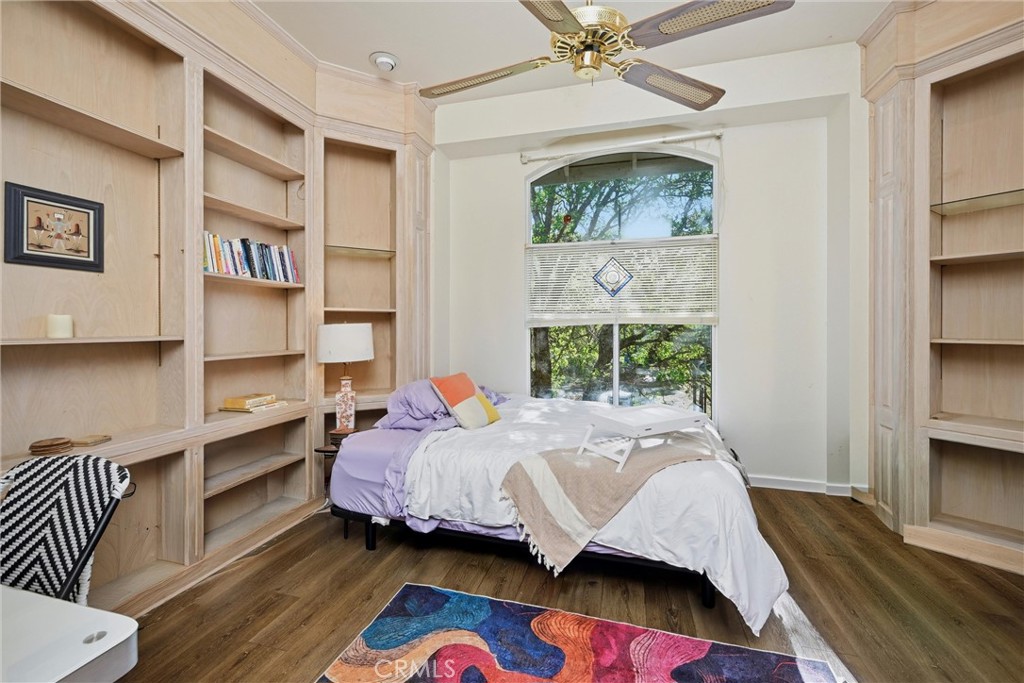 19552 Powder Horn Road Hidden Valley Lake, CA 95467 - Photo 21 of 30 a bedroom with a bed closet and a window