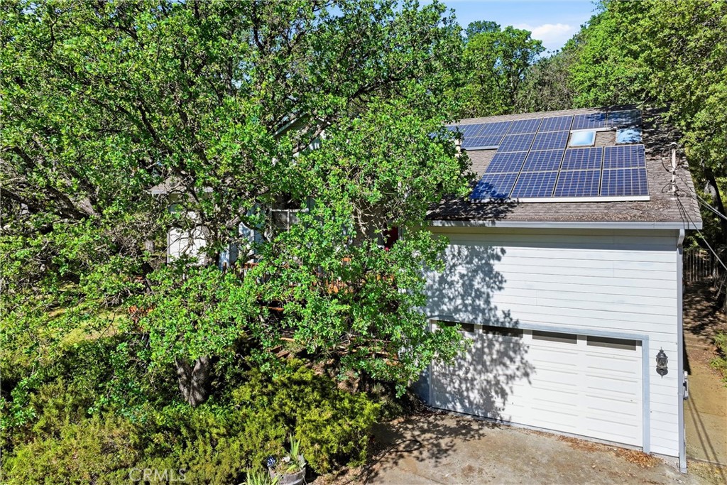 19552 Powder Horn Road Hidden Valley Lake, CA 95467 - Photo 5 of 30 a view of a house with a tree